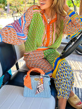 Pantalones bombachos holgados con bolsillos y cintura elástica con estampado único y colorido